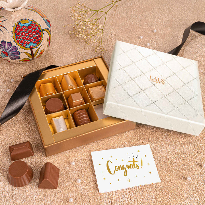 Assorted Classic Chocolates or Chocolate Bon bons in White leather box by Lals